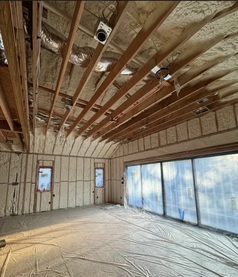 Interior walls and ceiling insulated with spray foam during new construction in Shirley